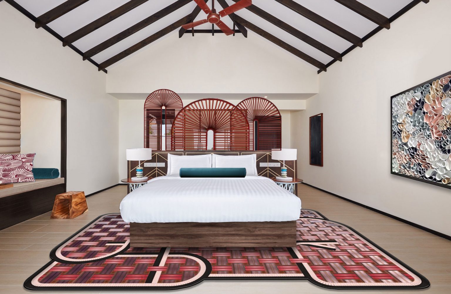 Spacious bedroom with high ceilings and exposed beams. Central white bed with red accents, unique patterned rug, and artwork; calm and modern ambiance.