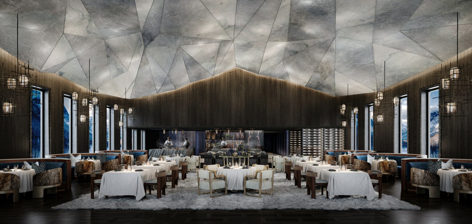 Spacious modern restaurant with geometric, vaulted ceiling, dim lighting, and elegant decor. White tablecloths and plush seating create a sophisticated ambiance.